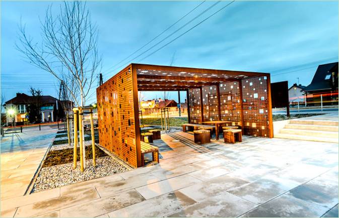 Közös pergola: körös-körül díszcserjék